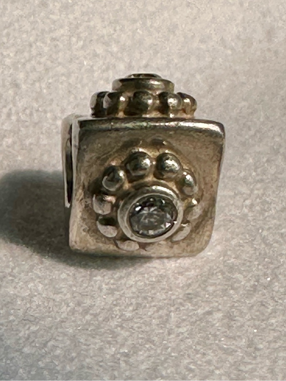 Retired Pandora Dotted Flower Triangle Charm